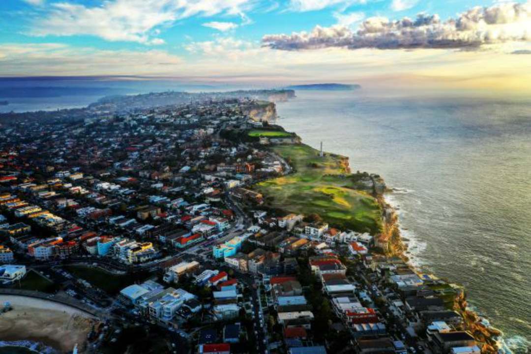 aerial view of houses near the bay